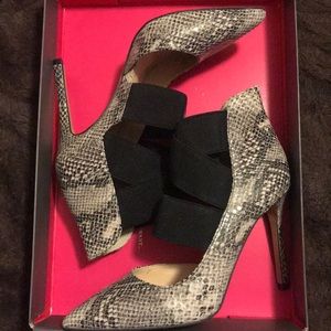 Vince Camuto snake print heels.